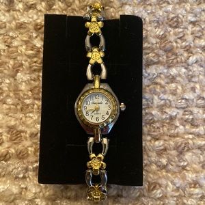 Silver and gold tone chain watch